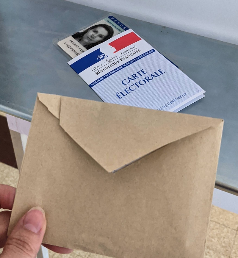 Preparing my ballot in the voting booth.