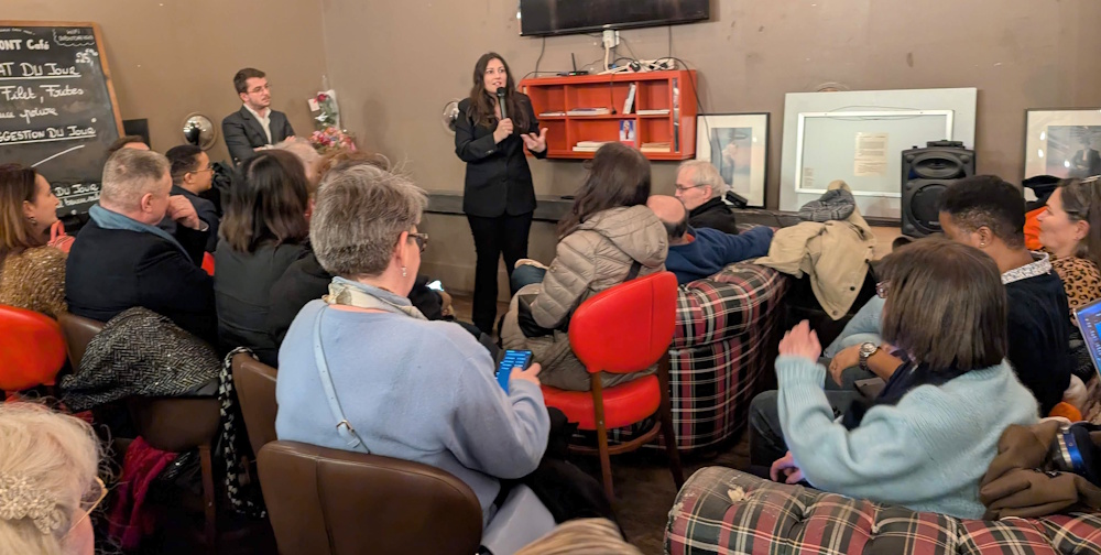 Pegah hosting one of the Horizons 13 neighborhood meetups at a local bar in the 13th.