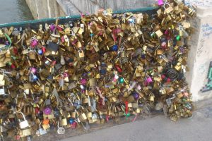 Padlocks on bridge