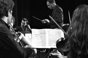 Sinfonietta musicians and conductor