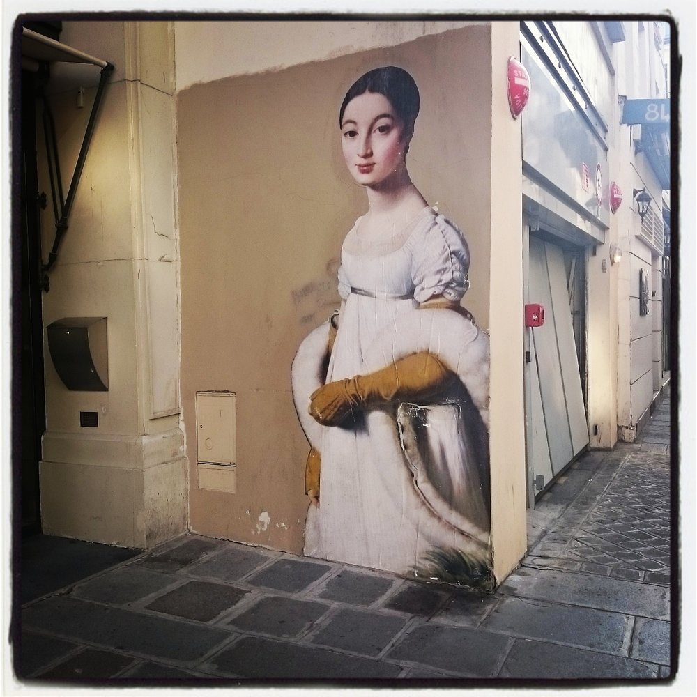 An Ingres portrait in street art/poster on the Rue St-Honoré