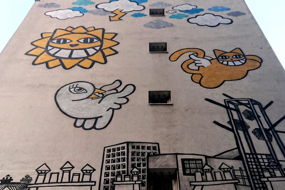 M. Chat mural