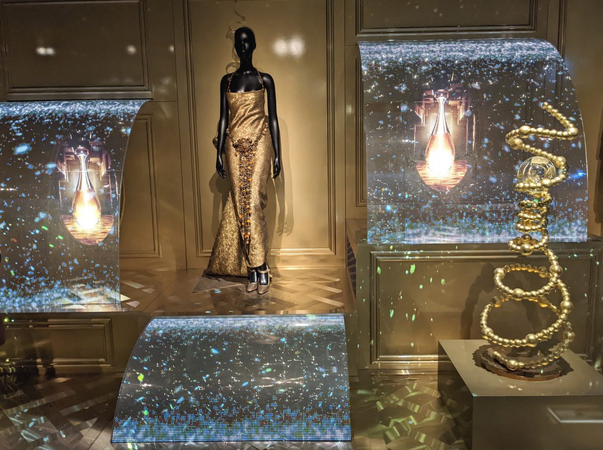 Gold dress from J'Adore perfume ads