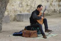 Musician on the quay