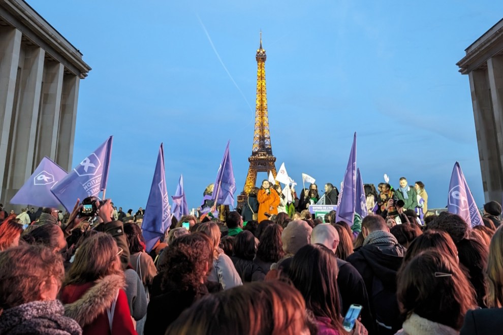 Flags waving at Trocadéro with Eiffel Tower in background