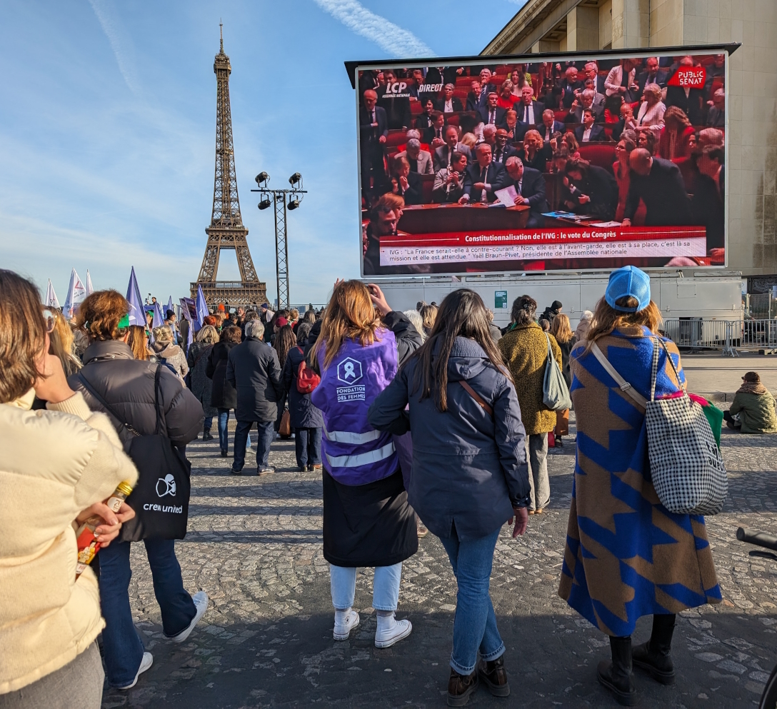 People at Place du Trocadéro to watch the big screen.