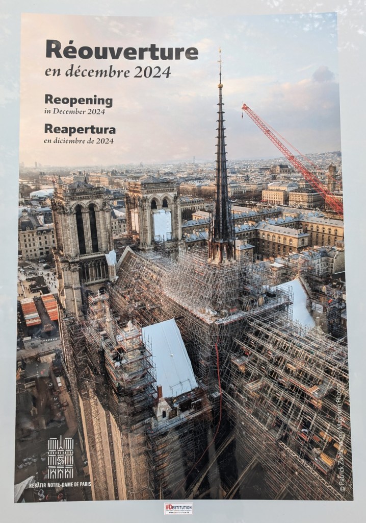 A poster announcing the reopening on