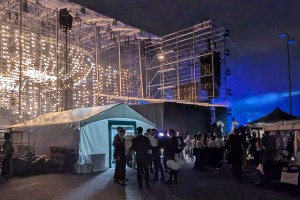 The volunteers' tent behind the concert stage on the Champ-de-Mars