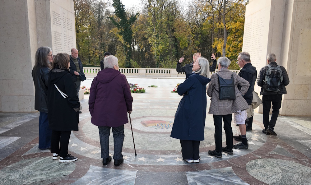 Corneliu takes the time to explain all of the symbols decorating the monument.